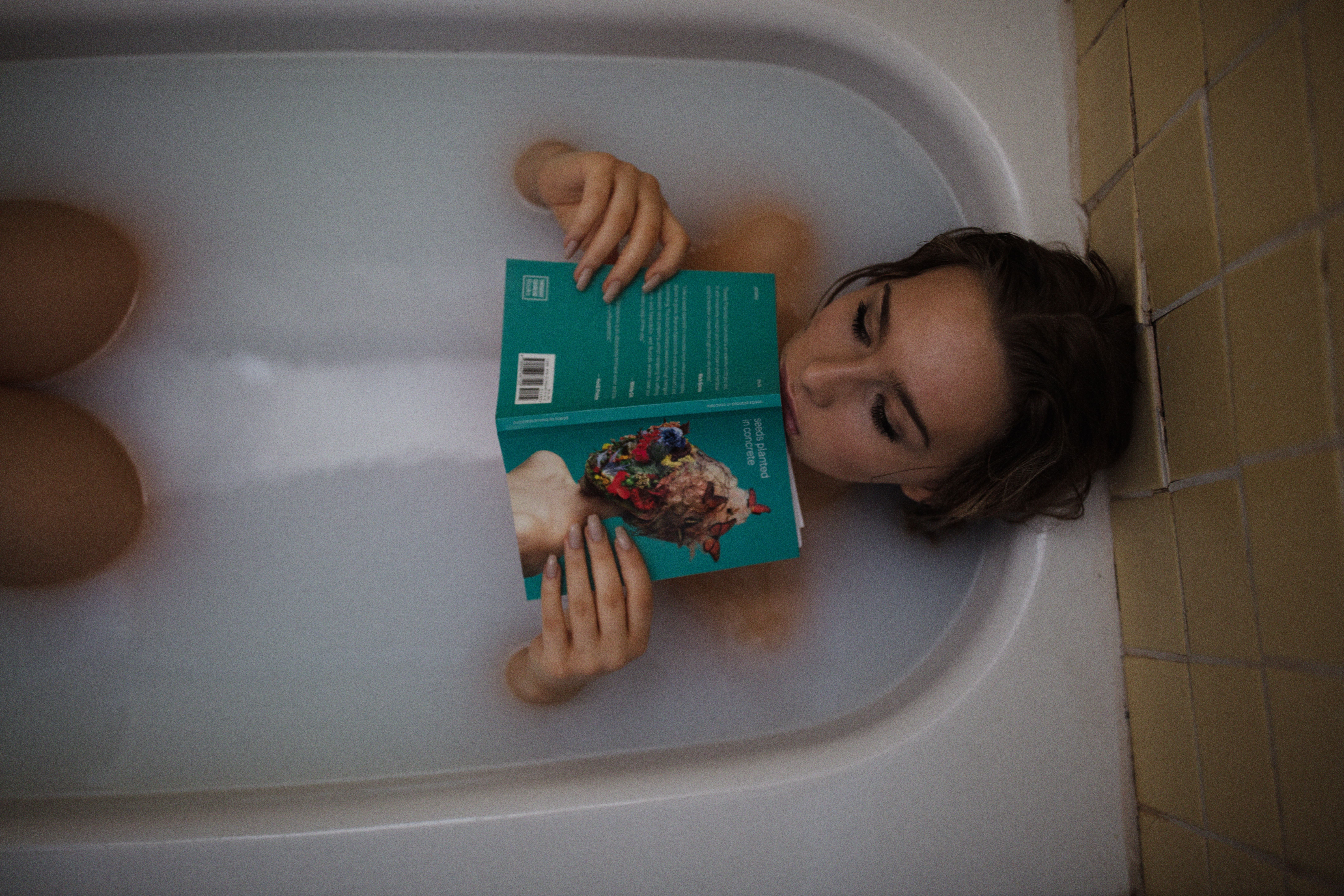woman relaxing in the bath tub